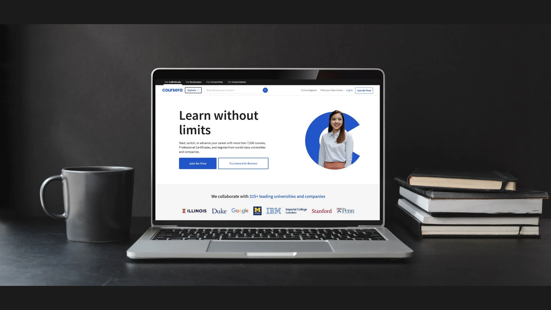 A laptop screen displaying Coursera online learning platform website.
