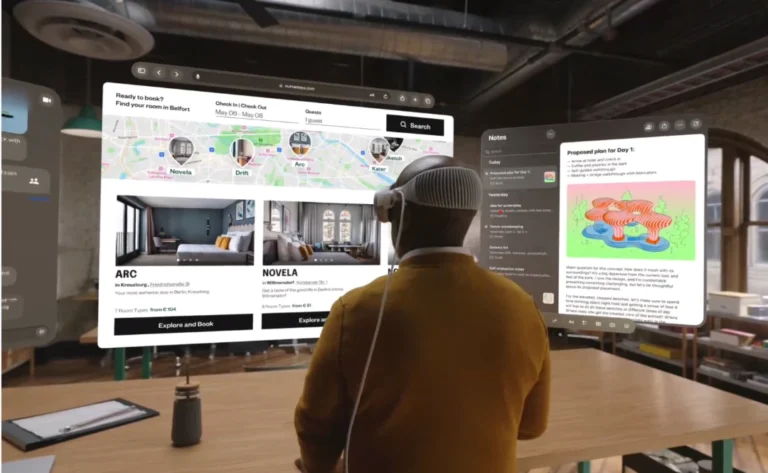 A man browsing on the web while wearing an Apple Vision Pro