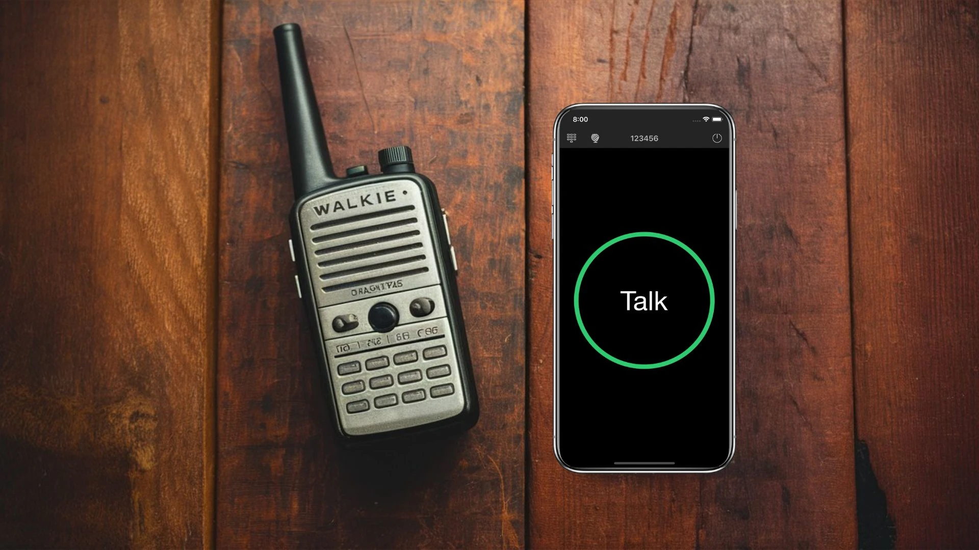 A vintage walkie-talkie next to a smartphone displaying a walkie-talkie app.