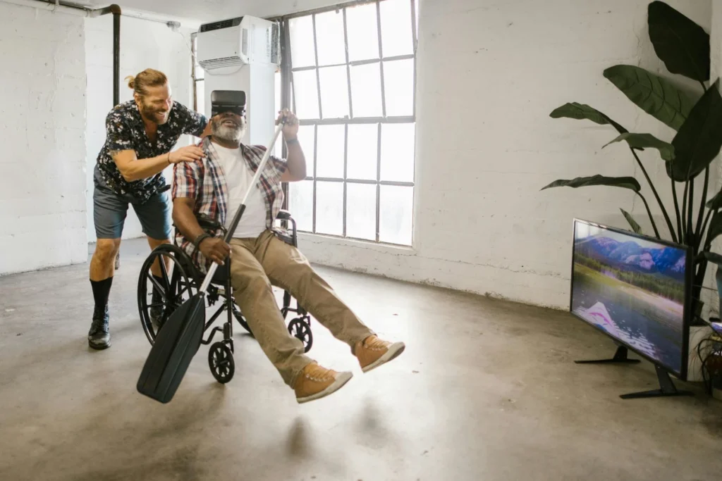 Man in a wheelchair wearing a VR headset